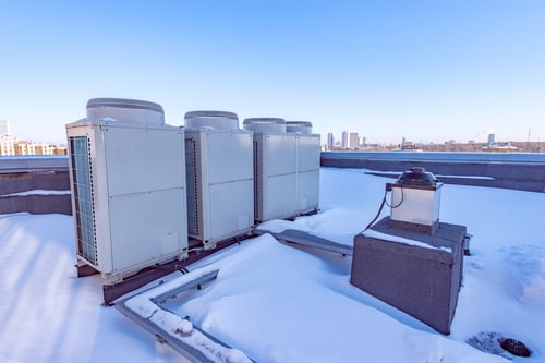 How does the defrost cycle work in VRF systems during the winter? 